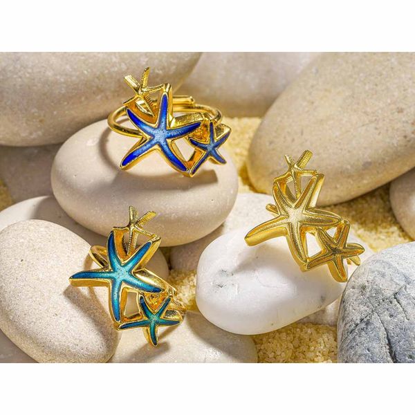 Ring ATLANTIS turkis sjøstjerner gull Onirolithi