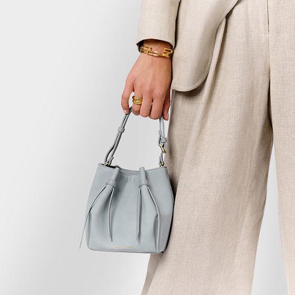 Håndveske - skulderveske CELINA MINI lys dus blå Katie loxton 